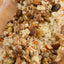 Arroz Huérfano con Piñones, Almendras y Chicharrón